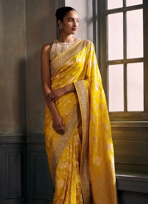 yellow banarasi saree wedding guest outfit