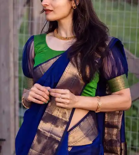 blue color simple half puff hand blouse paired with blue saree