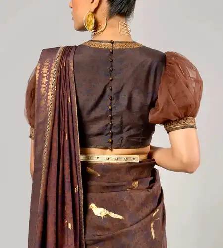 brown puff blouse with high back neck adorned with potli button