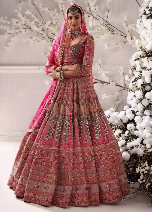 Manasa wearing pink bridal lehenga
