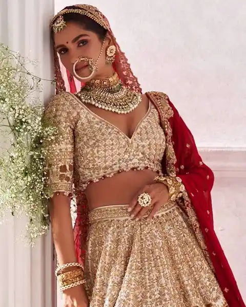 ivory gold embellished elbow sleeve wedding lehenga choli design