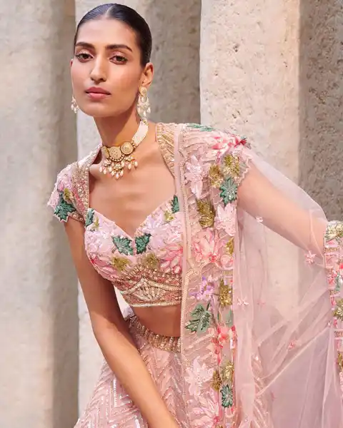 short sleeve baby pink lehenga blouse with simple embroidery