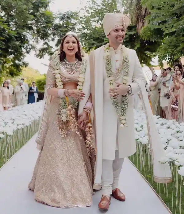 Parineeti worn beige lehenga by Manish Malhotra for her wedding