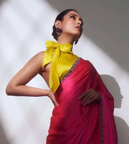 Tamanna wearing pink saree with yellow halter blouse