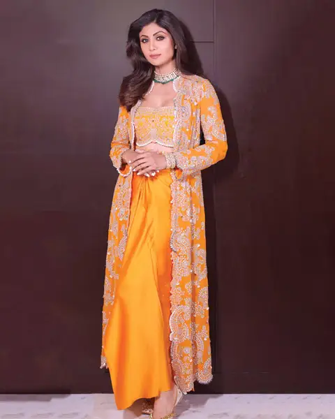 Shilpa Shetty looks stunning in a sunshine yellow Indo-western dress.