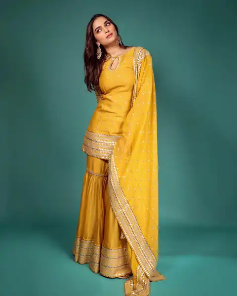 Yellow Sharara outfit for diwali celebration