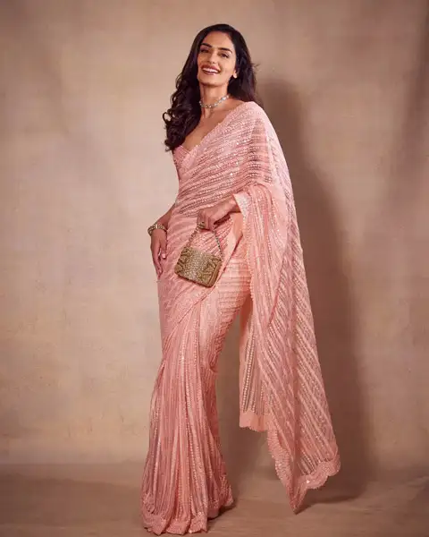 Manushi Chhillar's elegant look in peach sequin saree
