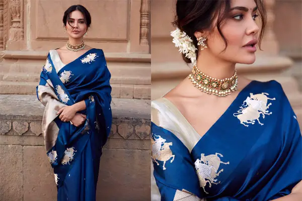 Esha Gupta worn blue silk saree making ideal wedding guest look.