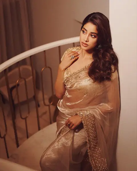Janhvi Kapoor wore gold tissue saree with short sleeve blouse