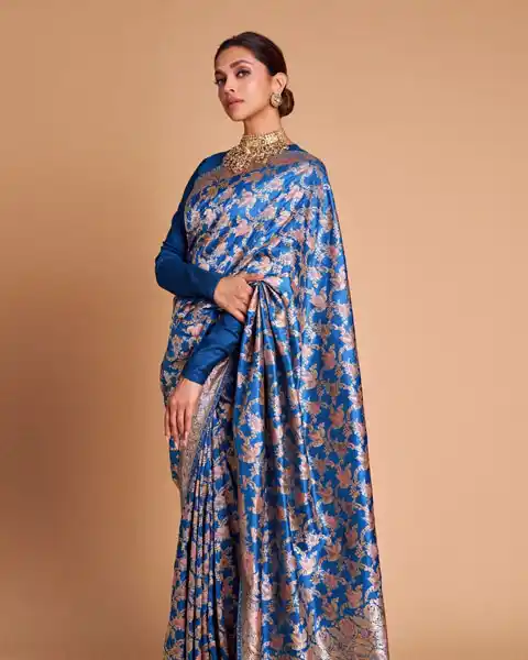 Deepika Padukone wore a blue banarasi silk saree- wedding guest attire