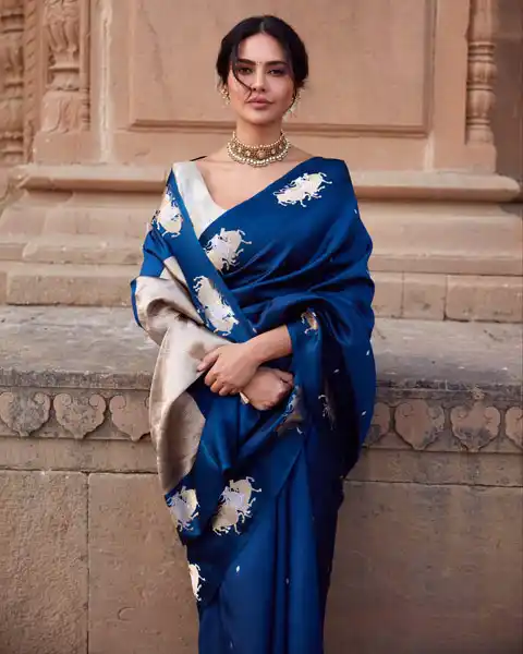Esha Gupta embraces wedding guest look in blue silk saree