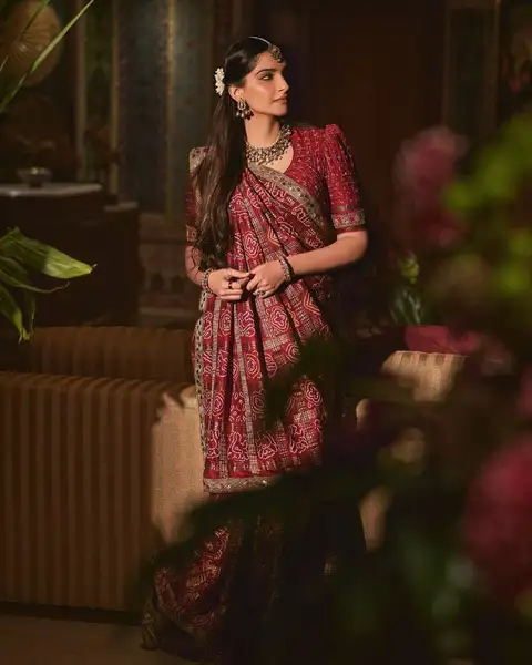 Sonam Kapoor maroon saree for wedding guest look